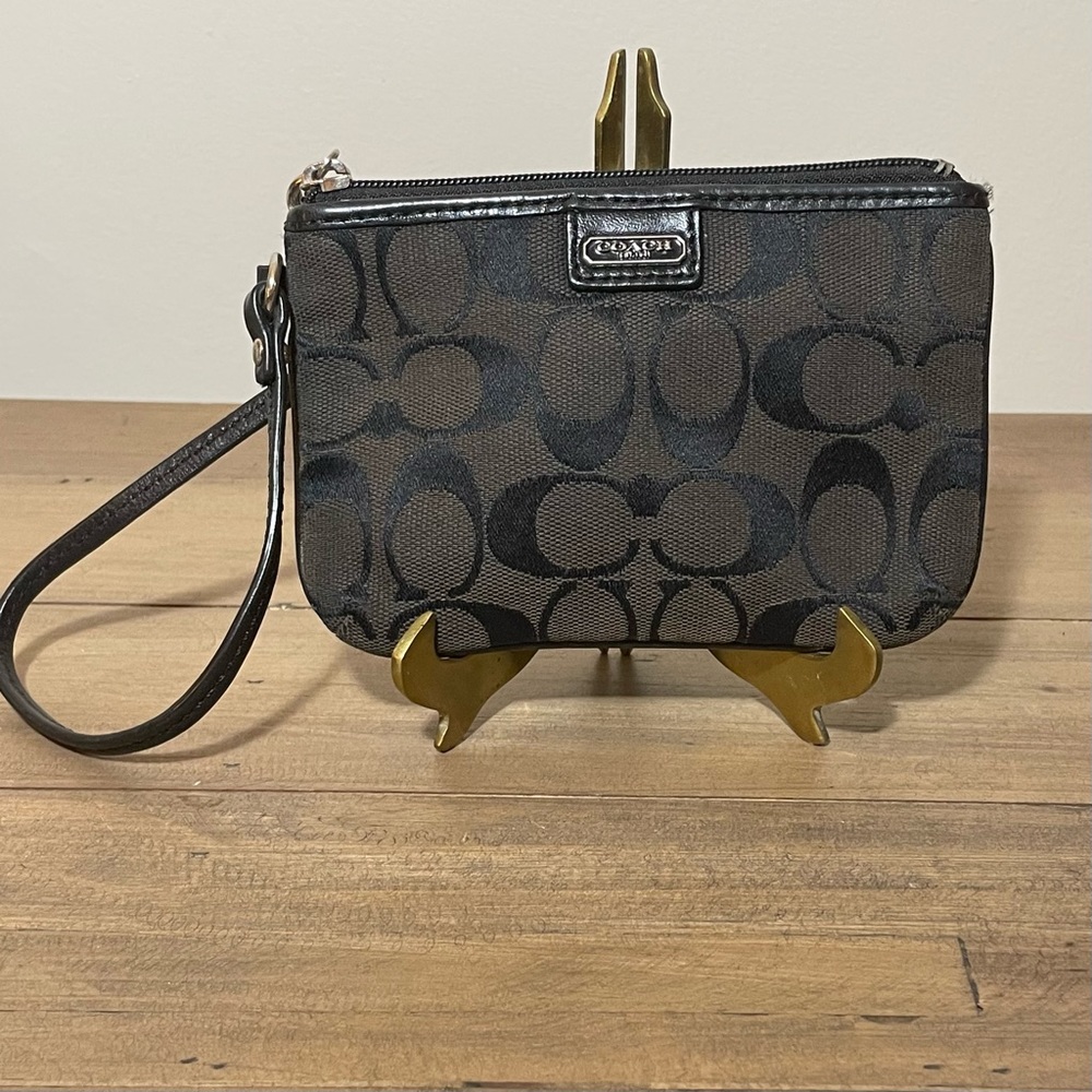 Coach logo cloth and leather wristlet coin purse. Great used condition.